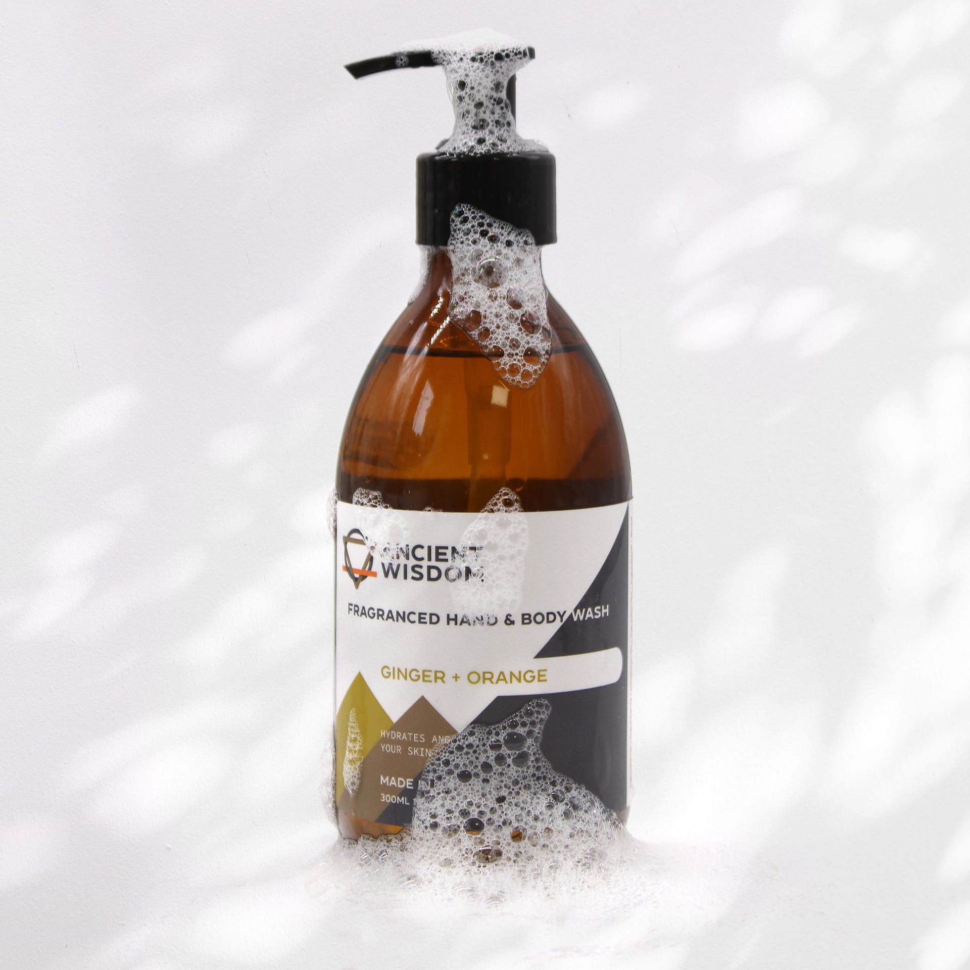 Raspberry & Pomegranate Hand & Body Wash 300ml 3 Raspberry & Pomegranate Hand & Body Wash in a sleek bottle with a fruity scent.