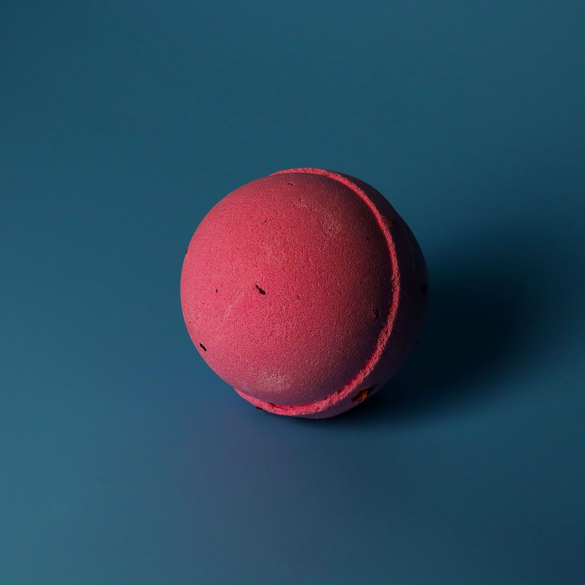 Set of 3 Rose & Petals Bath Bombs 2 Set of three rose and petals bath bombs in rich rose-pink tones.