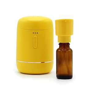 Rechargeable yellow essential oil diffuser with USB charging capability.
