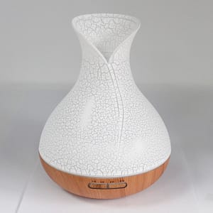 Palma Atomiser with shell effect design and colour-changing LED lights.
