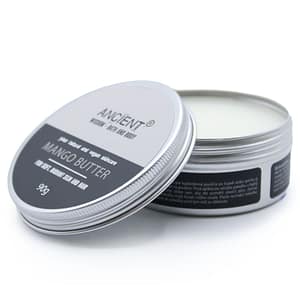 Luxurious mango body butter in a stylish jar, perfect for self-care routines.